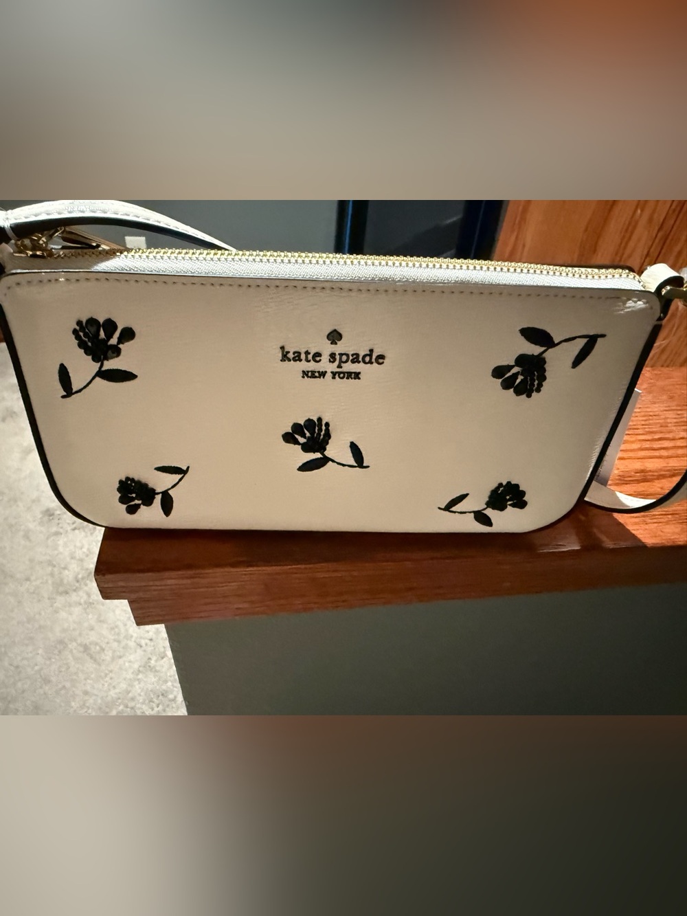 kate spade cream cosmetic pouch with black floral print